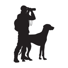 Silhouette of man with dog watching wildlife using binoculars outdoor