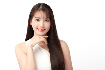 Fototapeta premium A beautiful young Asian woman with clean, fresh skin against a white background. Skincare, facial treatment, cosmetology, beauty, and spa. An elegant portrait of an Asian woman.