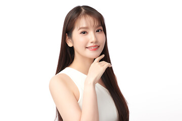 Fototapeta premium A beautiful young Asian woman with clean, fresh skin against a white background. Skincare, facial treatment, cosmetology, beauty, and spa. An elegant portrait of an Asian woman.