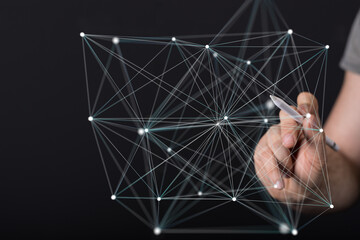 Abstract image of a hand interacting with a digital network.  Perfect for tech, data, and...
