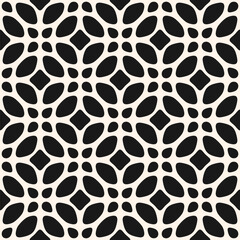 Vector black and white floral ornament. Abstract geometric seamless pattern with flower silhouettes, leaves. Simple monochrome background in oriental style. Endless ornamental texture. Repeated design