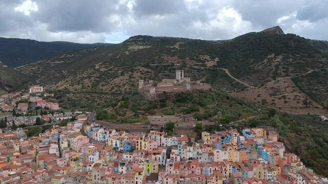 The drone view above the city of Bosa, Italy, Sardinia
