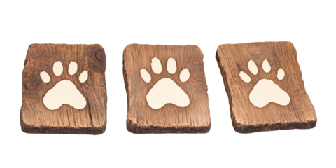 Decorative wooden pieces with animal paw prints, suitable for home decor, pet themes, and nature-inspired designs