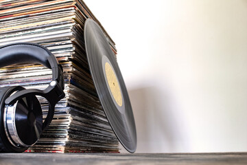 Classic vinyl records and headphones. Pure nostalgia in sound.