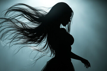 Drag queen flipping her long hair in a powerful motion silhouette