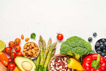Healthy food assortment on white background.
