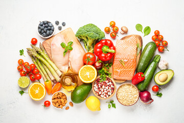 Healthy food assortment on white background.