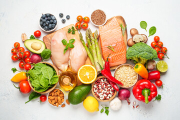 Healthy food assortment on white background.