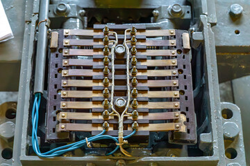 Electromechanical railway relay with a series of contacts and wires, used in older train traffic control systems. A component typically found in signal boxes, responsible for controlling signals, swit © Adam