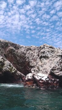 Dramatic Red Rock Cliffs in Paracas National Reserve, Peru