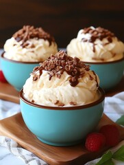 Delicious bowls of creamy dessert topped with chocolate shavings, perfect for satisfying sweet cravings and celebrating special occasions.