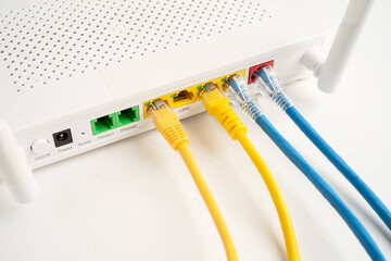 Ethernet cable with wireless router connect to internet service provider network.