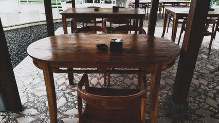 table and chairs in a semi outdoor cafe