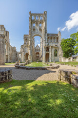 View into the ruined church of Jumieges Abbey with no roof above the church