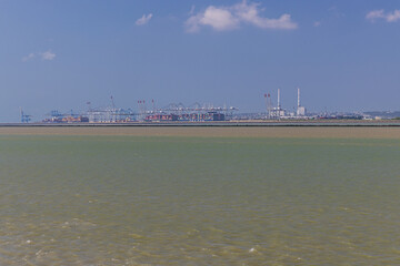 View across the Seine river of the harbor installations of Le Havre, seen from Honfleur, an important tourist place in Normandy