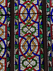 Stained glass windows at st.Stephen church ooty. Gothic cathedral interior with vibrant stained glass windows casting radiant multicolor light onto pews.View of the interior of the beautiful church.
