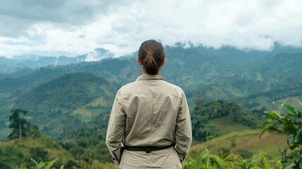 Naklejka premium environmental conservation wildlife protection reforestation. Biologist observing endangered bird in a recovering reforested area