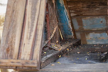 Ancient wooden well.Spider web in an abandoned well.