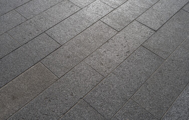Grey stone street road, pavement texture background