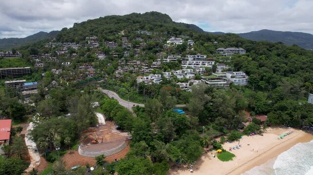 Aerial drone view of a resort at Phuket, Thailand at Surin beach, Pansea beach at Baan Thai Choeng Thalay during the sunny day with clouds in the sky in May 2025 beach in 2025