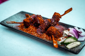 meat skewer on a plate