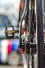 detail of a bicycle rear wheel with spokes and a disc brake rotor