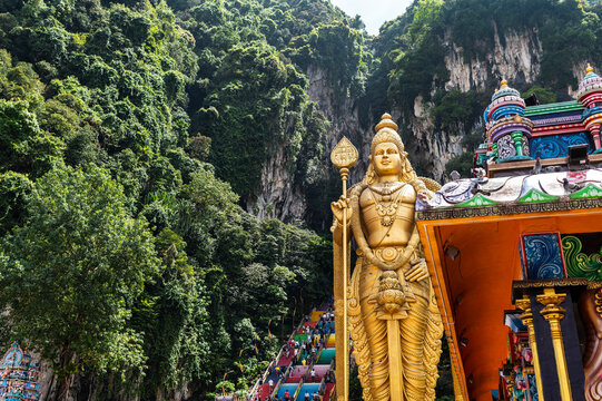 Golden Murugan statue and temple at Batu Caves, Kuala Lumpur