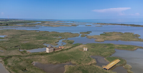 Porto Tolle is located between the Po di Maistra and Po di Gnocca rivers and is cut in half by the Po di Venezia (Parco regionale del Delta del Po)