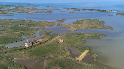 Porto Tolle is located between the Po di Maistra and Po di Gnocca rivers and is cut in half by the Po di Venezia (Parco regionale del Delta del Po)