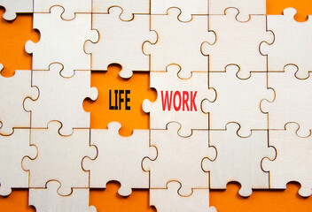 Fototapeta premium Life or Work symbol. Concept word Life or Work on wooden puzzle. Beautiful orange background. Business and Life or Work concept. Copy space