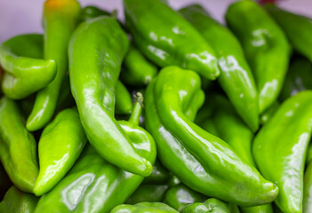 Fresh green peppers filling the frame