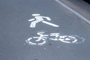 Road pictographs a single sidewalk area for pedestrians and cyclists