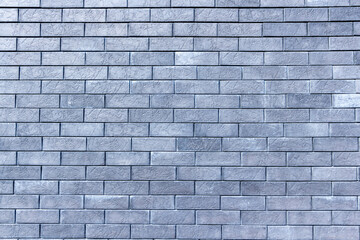 Modern brick wall in gray graphite color