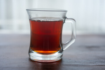 rooibos tea in glass cup close up