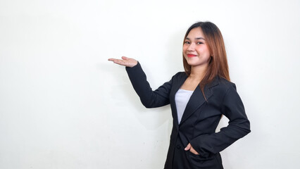 Beautiful asian business woman is giving a speech to people. Successful woman in black suit...