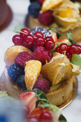 Berry citrus fruit tart on display