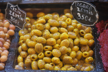 Yellow olives displayed at a local market stall in Turkey