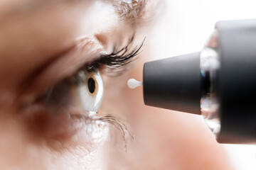 A device for measuring intraocular pressure. Close-up of the eye during diagnosis. The concept of...