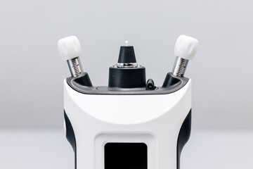 Portable tonometer for close-up intraocular pressure measurement on the table. Concept of...