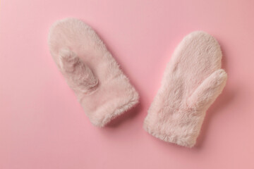 Cozy Pink Furry Mittens on Soft Pastel Background
