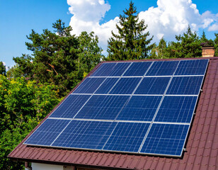 Naklejka premium solar panels on a roof