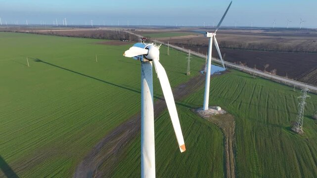 Close-up of a destroyed wind turbine generator. Strong winds and high speeds break the propellers. Destroyed infrastructure Disaster. Windmill, energy production