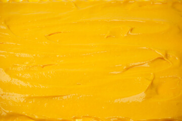 Yellow sauce splashes as a background.