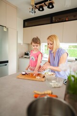 Joyful cooking moments in a modern kitchen with family