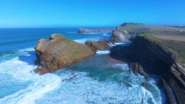 Waves on the cliffs of Madero Beach in the Dunes of Liencres Natural Park. Liencres, Pi&eacute;lagos Municipality, Costa Quebrada Geopark, Cantabrian Sea, Cantabria, Spain, Europe