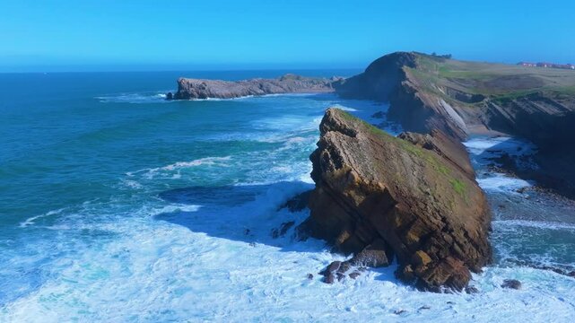 Waves on the cliffs of Madero Beach in the Dunes of Liencres Natural Park. Liencres, Pi&eacute;lagos Municipality, Costa Quebrada Geopark, Cantabrian Sea, Cantabria, Spain, Europe
