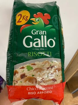 Palmanova, Spain - May 29, 2025: Gran Gallo Risotto rice package showcasing 2kg of Arborio rice, featuring vibrant branding and colorful design elements for culinary enthusiasts and chefs