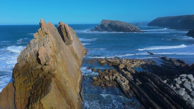 Waves on the cliffs of Madero Beach in the Dunes of Liencres Natural Park. Liencres, Pi&eacute;lagos Municipality, Costa Quebrada Geopark, Cantabrian Sea, Cantabria, Spain, Europe