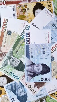 Paper money, South Korean banknotes as a financial business background. Cash, investment, banking
