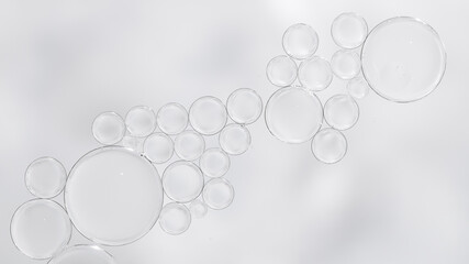 Transparent skincare serum texture with air bubbles on light background